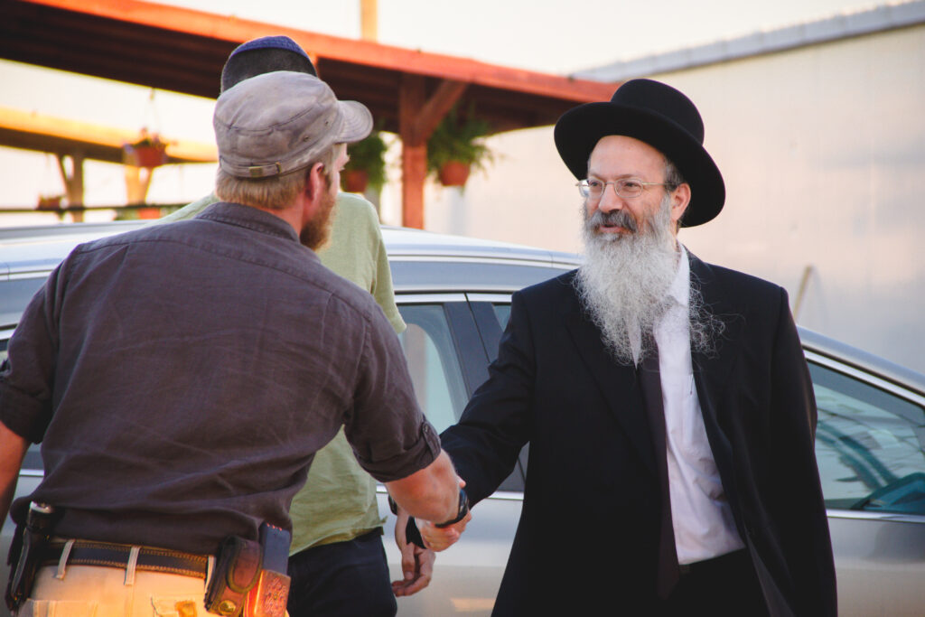 Meeting local Jewish people on HaYovel Israel tree planting volunteer trip.