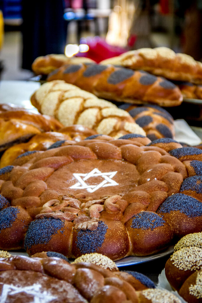 Challah bread during sabbath on Israel tree planting volunteer trip